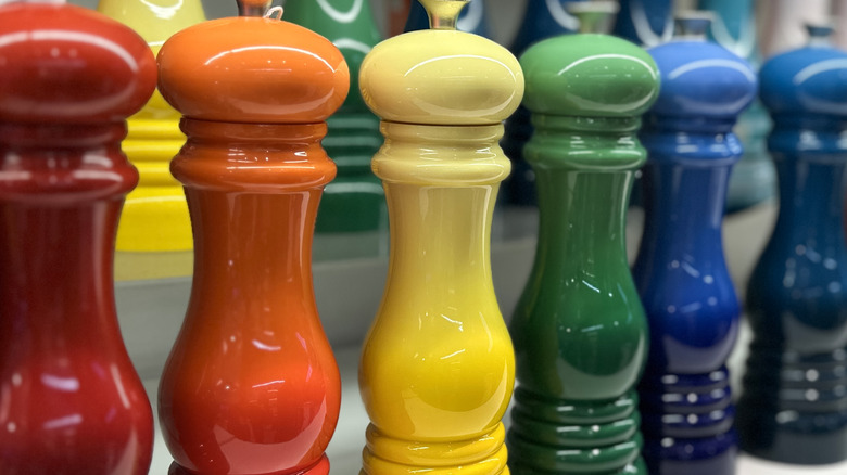 Rainbow colored wooden salt and pepper grinders