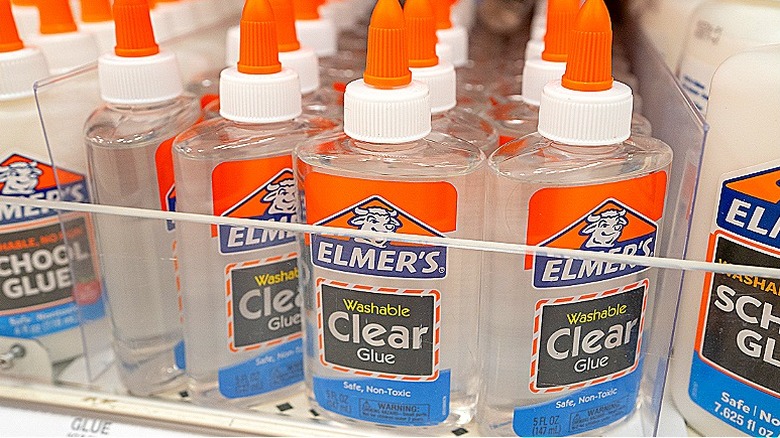 Elmer's glue bottles on a shelf in a store