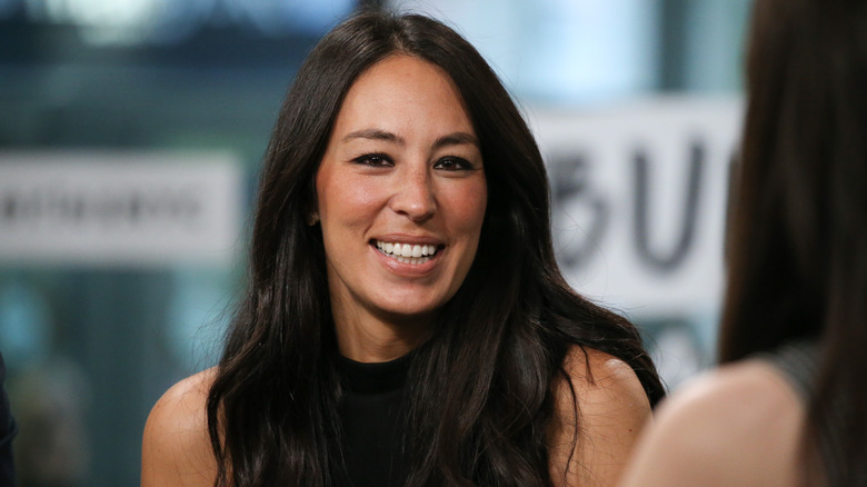 Joanna Gaines in a black sleeveless top