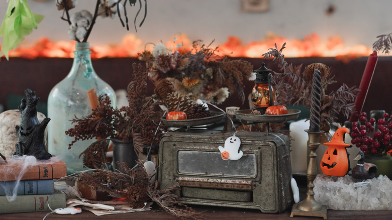 Vintage Halloween decor on a table.