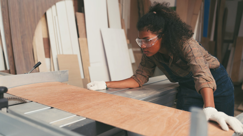woman working with plywood