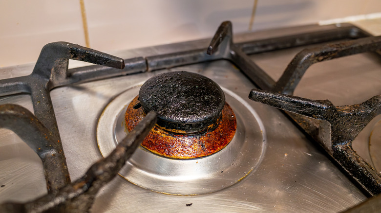 A close-up shot of dirty stove grates