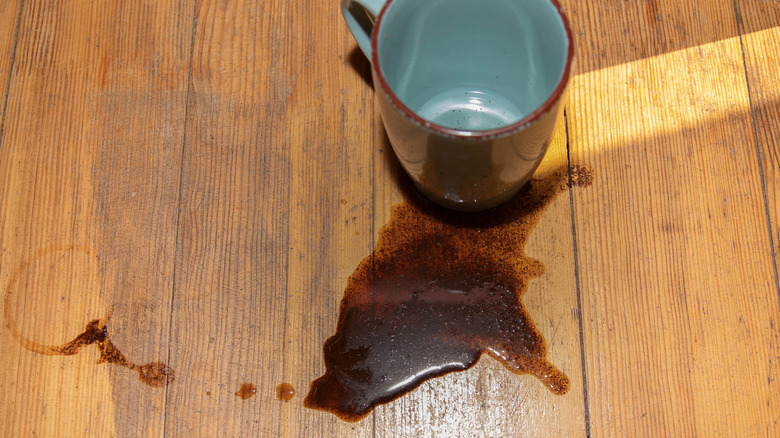 Coffee spilled on wood flooring