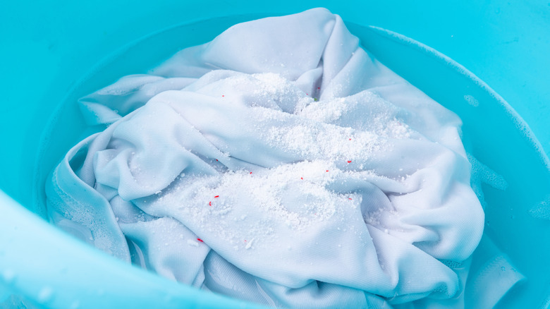 White shirt soaking in water and oxygen bleach