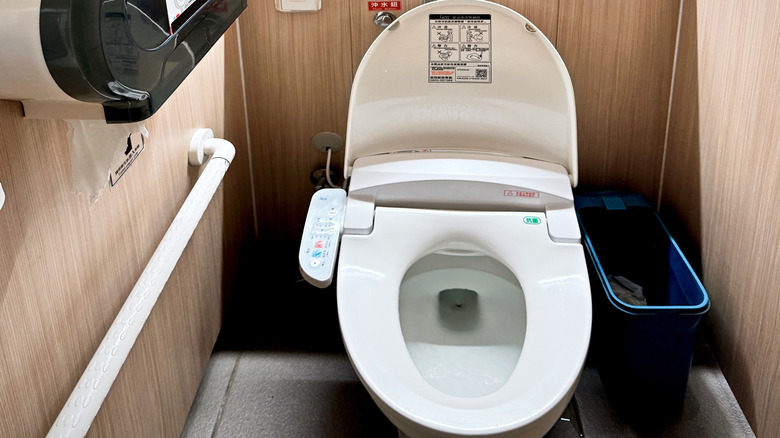 Moderately priced bidet toilet seat with a large control panel on the side