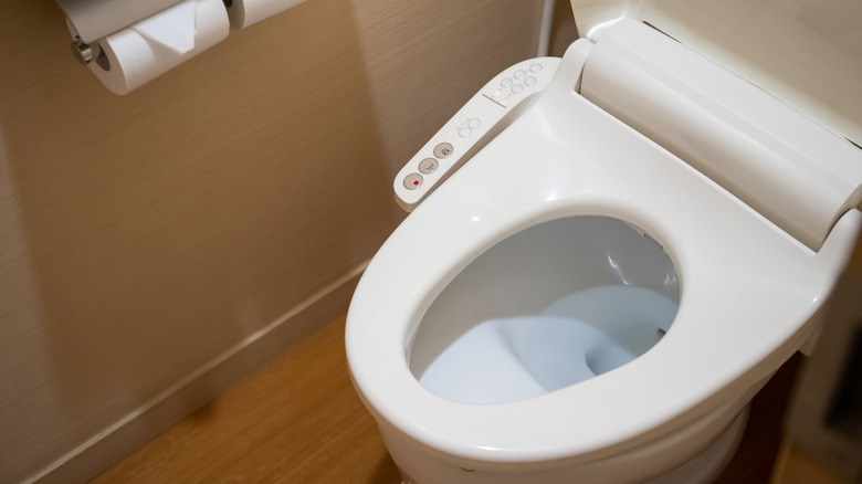 Bidet toilet seat in a bathroom