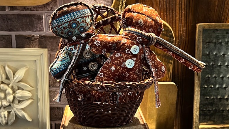 Gingerbread pillows in a woven basket on a table