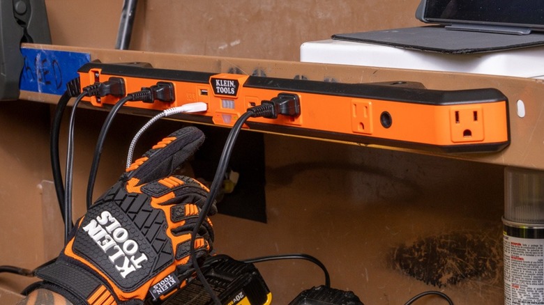 Klein Tools Magnetic Power Strip mounted above garage work area