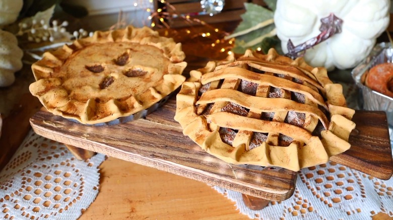 Imitation pies on a wood boards in a kitchen