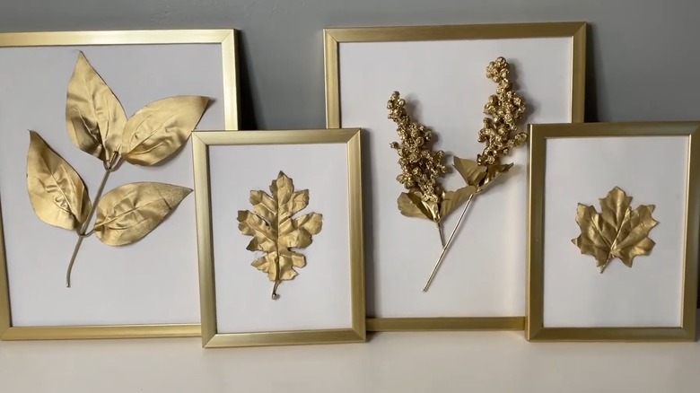 Golden frames displaying golden leaves and florals