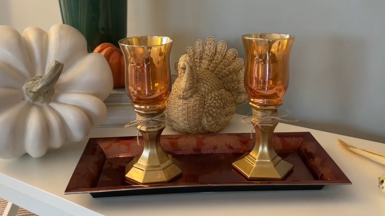 DIY vintage candle holders on a decorative tray