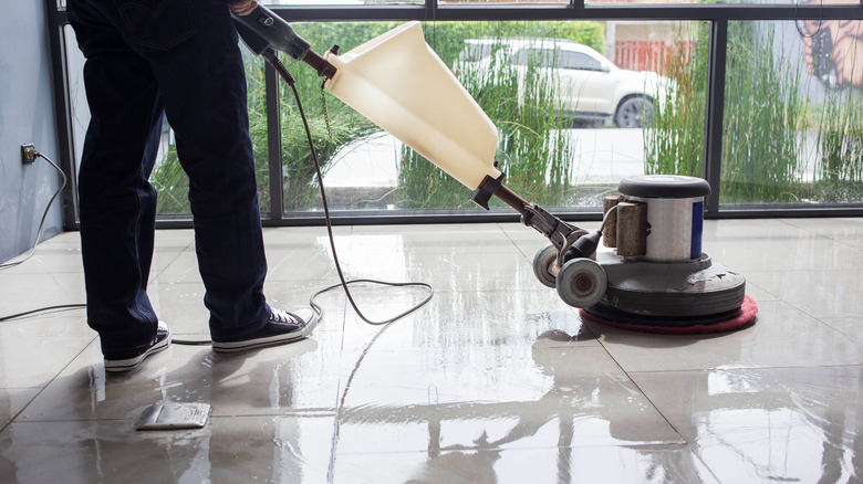 Person polishing floor