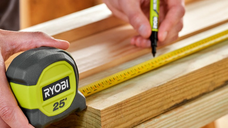 A close up shot of a Ryobi tape measure
