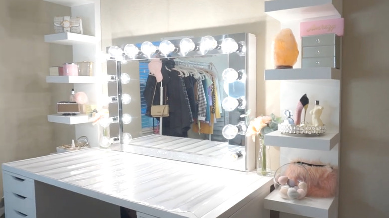 DIY vanity mirror with lights on white desk