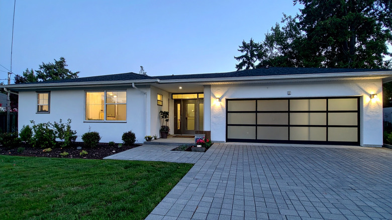 Outside of the front of a white California ranch-style house