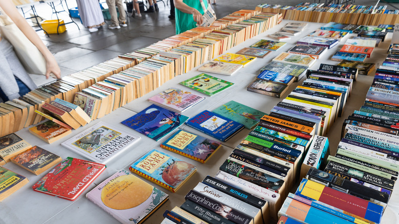 close up of books laid out on a table for sale