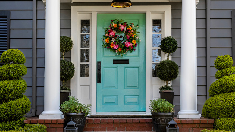 Blue entry door to home