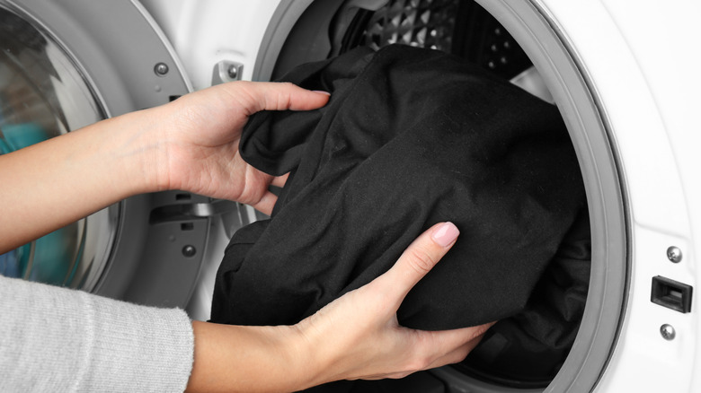 Removing black sheets from washer