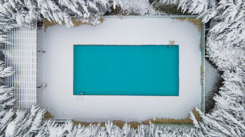 pool surrounded by snow