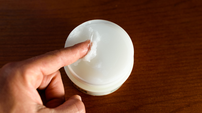 Finger in petroleum jelly 