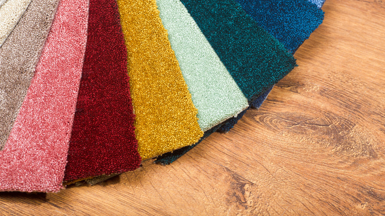 Carpet color options against a wood floor