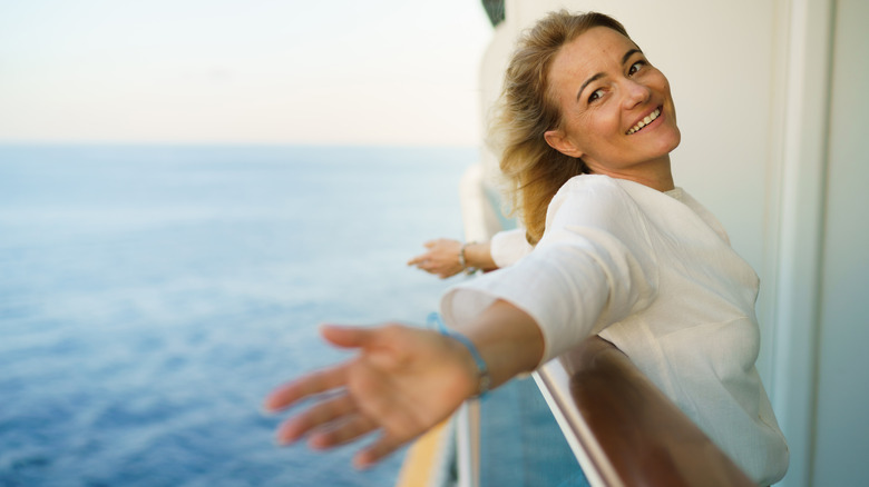 Woman on a balcony of a cruise ship