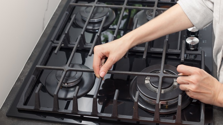 placing stove grates 