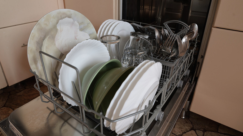 Dishes, including ceramics and stoneware, dry in a dishwasher