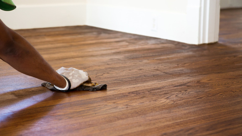 Staining hardwood floors with a cloth