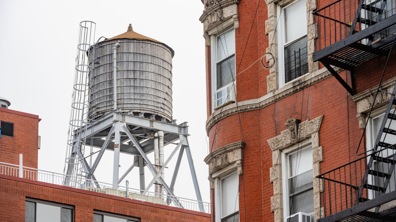 Apartment building with a rooftop water tower