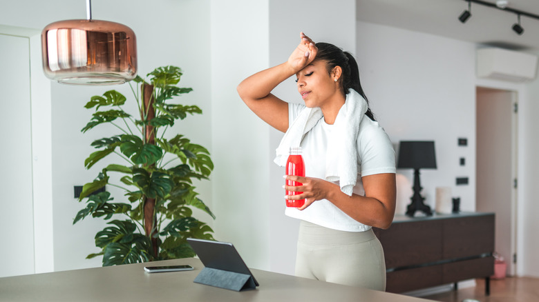 Woman sweating after workout