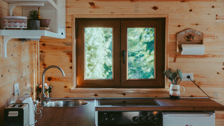 wood paneled kitchen