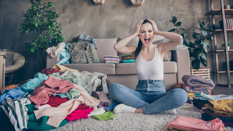 Woman screaming at clothes