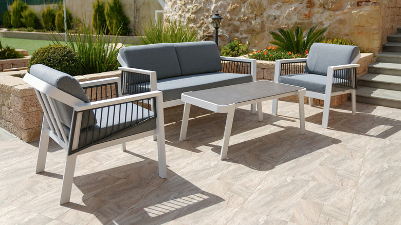 Cast aluminum table and chairs in patio