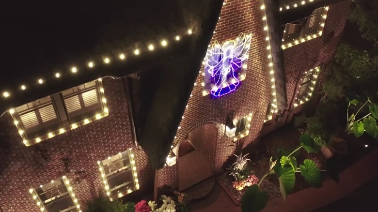 Rebecca Robeson's brown brick home with holiday lighting