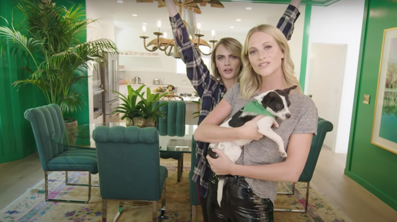 cara and poppy delevingne with dog