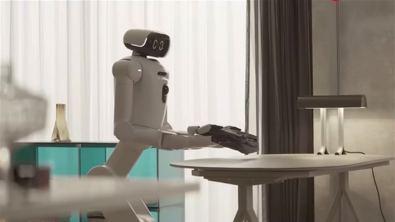 LG's CLOiD robot placing folded garment on table
