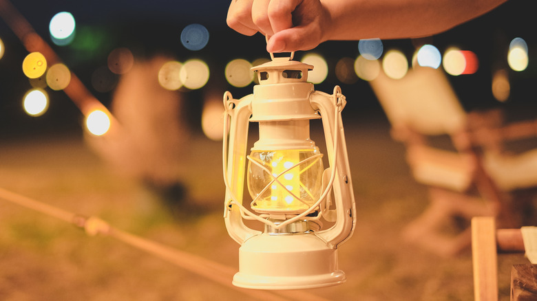 Someone holding a lantern