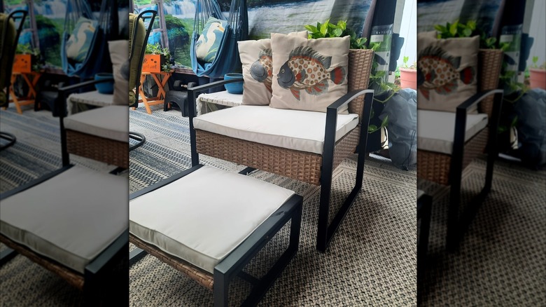 A reviewer's photo of their Aldi chair and ottoman set.