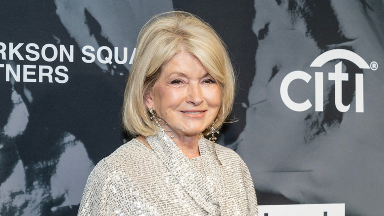 Martha Stewart posing in from of citi sign.