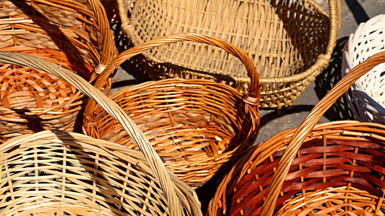 Wicker baskets on the ground at a flea market