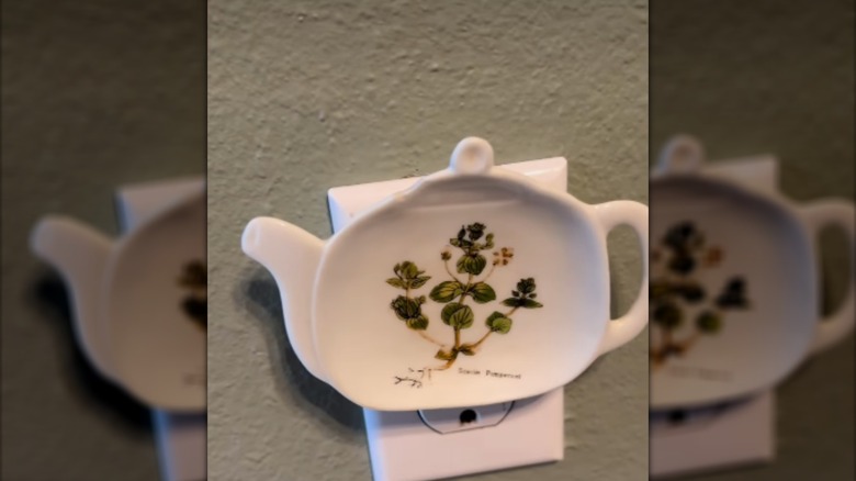 DIY outlet cover using thrifted trinket dish