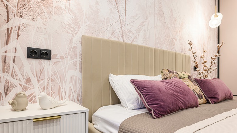 Bedroom with patterned wallpaper