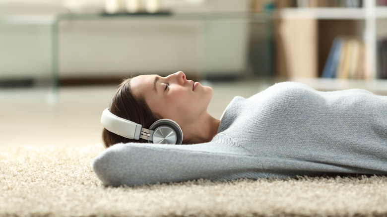 Listening to music on carpet