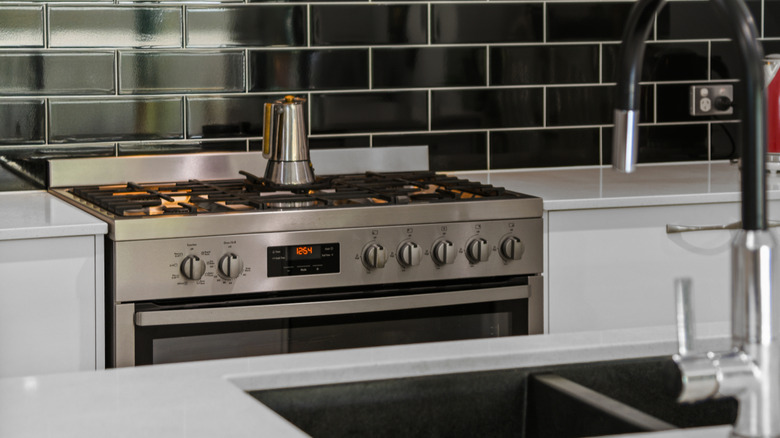 Black subway tile backsplash in a kitchen