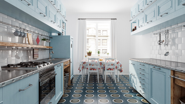 A kitchen with retro tile flooring.