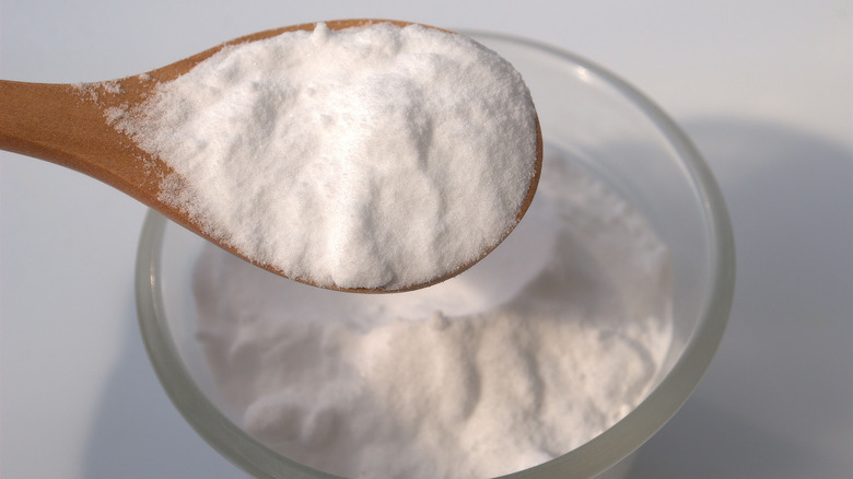 Close-up of spoonful of baking soda