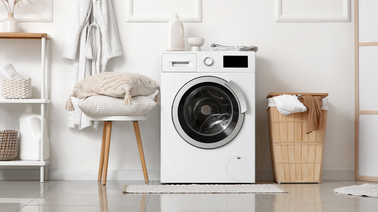Washing machine in a laundry room.