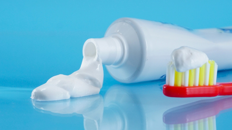 close up of toothpaste and toothbrush