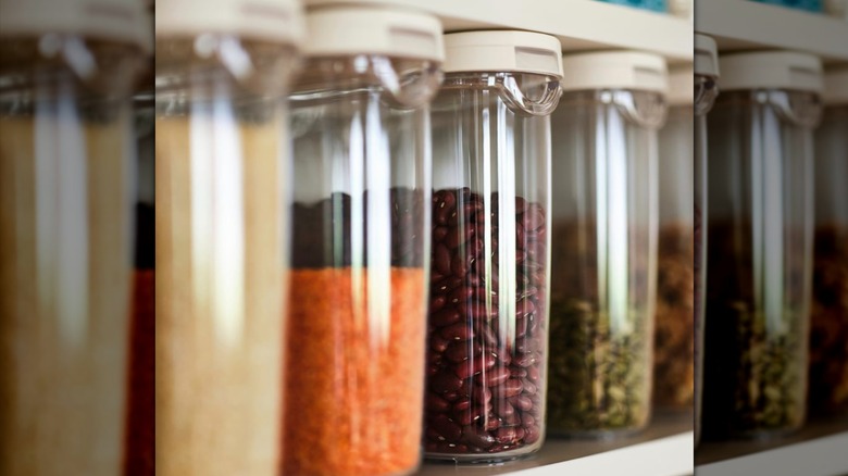 IKEA 365+ Dry food jar with lid in pantry holding a variety of dry beans and legumes